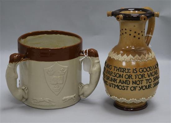 A Royal Doulton salt-glazed puzzle jug and a stoneware loving cup, puzzle jug 9in.